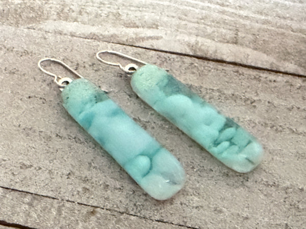 The Mermaids Mantle Collection.